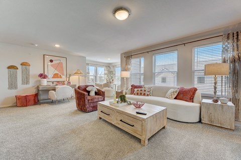 a living room with a couch and a coffee table